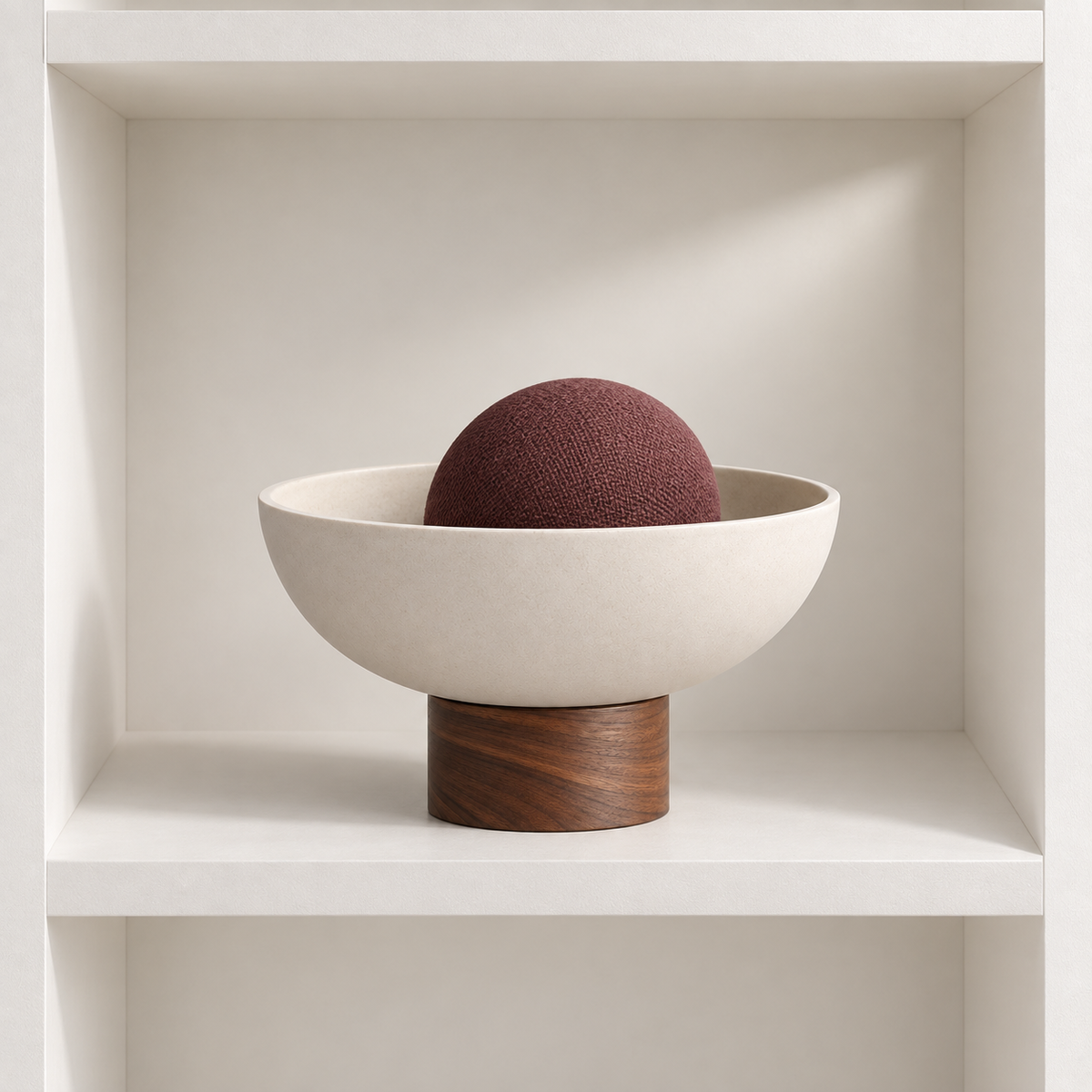 Lumerre Pedestal Bowl displayed in an open shelf