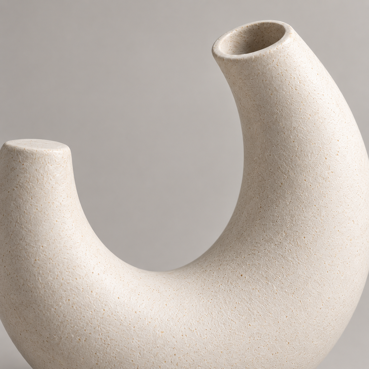 Solenne Arc Vase ceramic surface and inner arc detail